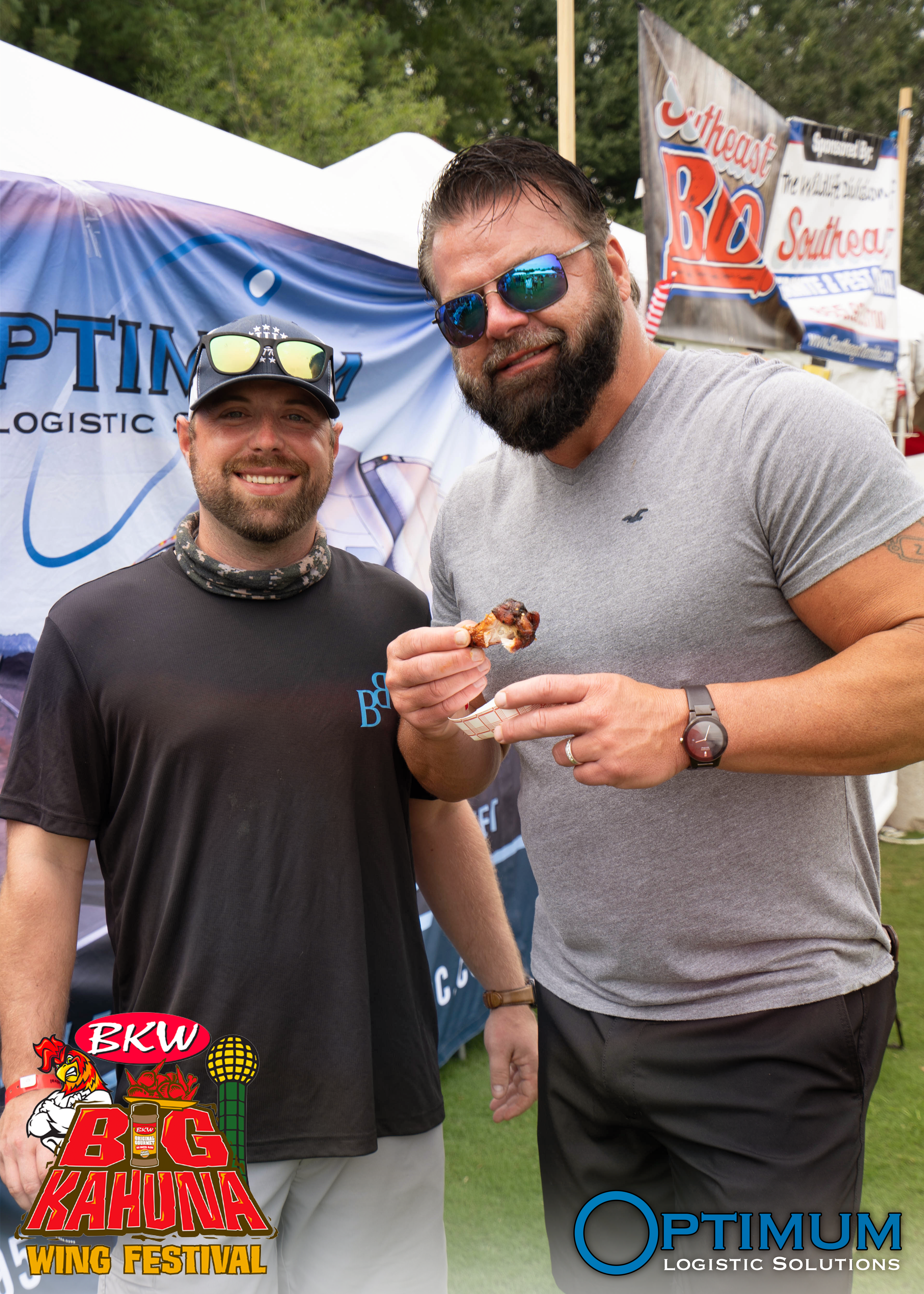 Chris and Rick enjoying a wing at the Big Kahuna Wing Festival 2022