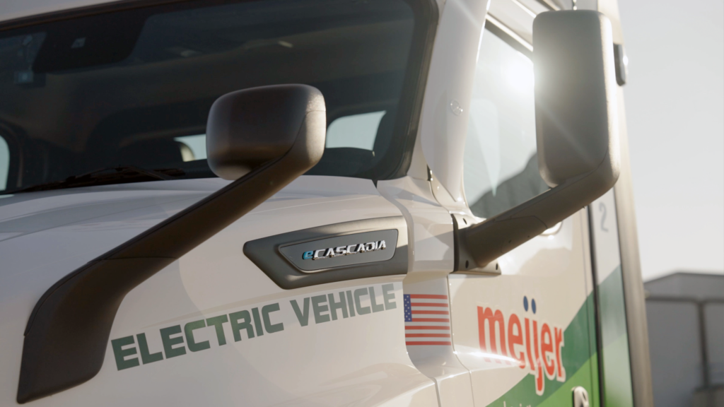 Freightliner's new all-electric eCascadia semi truck, featuring a sleek design and zero emissions technology for a more sustainable transportation option.